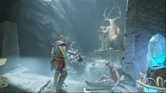 Exploring a cave as Kratos in our God of War PC review