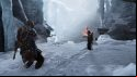 Kratos and Atreus exploring an icy cavern in our God of War PC review