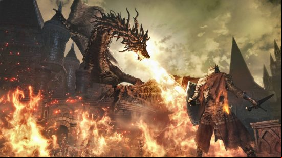 Best games like Monster Hunter: a dragon breathing fire from the top of a castle while a knight looks on in Dark Souls 3.