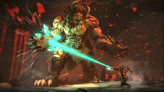 Best games like Monster Hunter: a hunter using a green crystal beam to hit an Oni's hand in Toukiden 2.