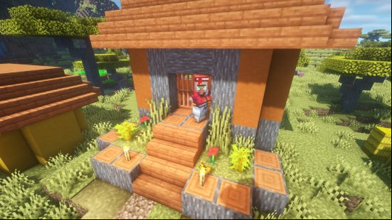 A Minecraft librarian villager stands outside his home in a savannah Minecraft village