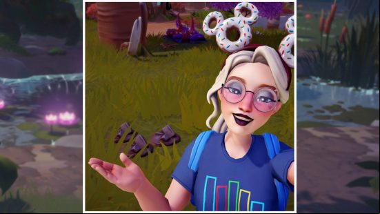 How to get Disney Dreamlight Valley clay: A player character takes a selfie, pointing out a piece of clay on the ground