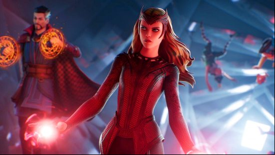 Now that's what I call PC games news 2022: A ginger superhero woman wearing a red outfit exuding red energy from her hands looks off into the distance as a man in a cape stands behind her