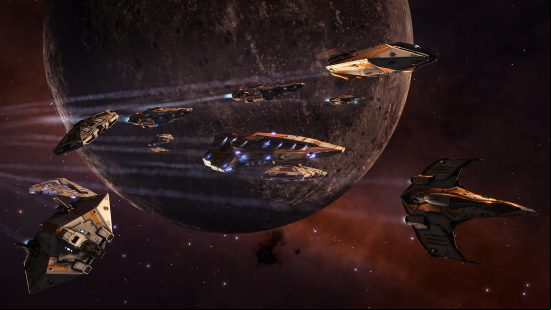 Games like Starfield - Elite Dangerous: A fleet of spaceships zooming past a planet