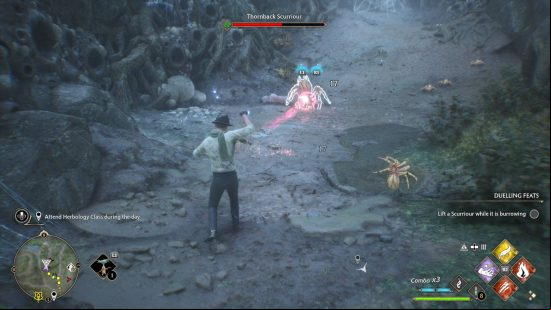 Hogwarts Legacy max level - the player is fighting against some spiders in a lair. The Thornback Scurriour is level 22, which is lower than the wizard's current level.