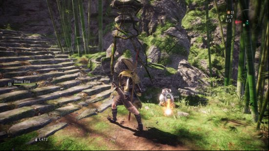 Wo Long Shitieshou pandas - a player has dropped an item in front of the panda to try and feed it.