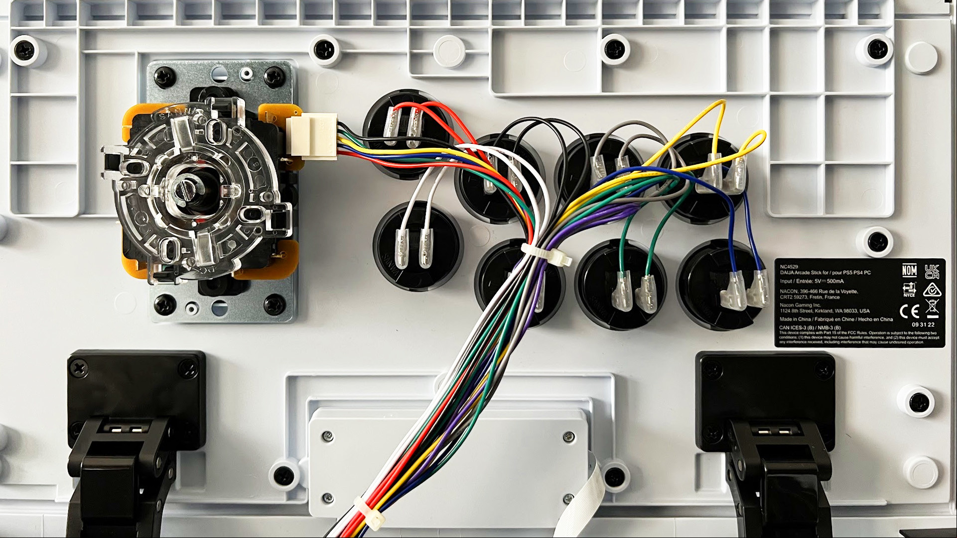 Nacon Daija Arcade Fight Stick internals showing wires and switches