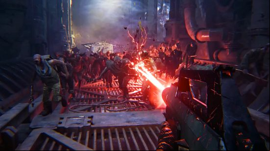 Warhammer 40k Darktide - a horde approaches the player, as they blast at the crowd with a lasgun.