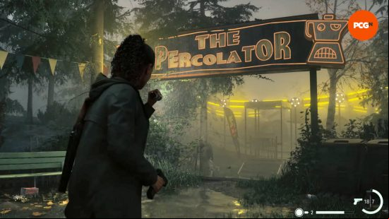 Alan Wake 2 gift shop safe: Saga is shining her flashlight on a sign for a ride called The Percolator. The ride is lit up and spinning behind the sign.