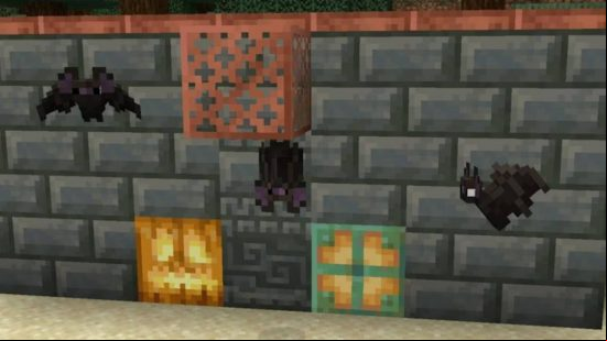 A blocky castle area with small black bats flying around in it