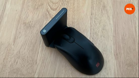 Zowie EC2-CW gaming mouse in charging stand