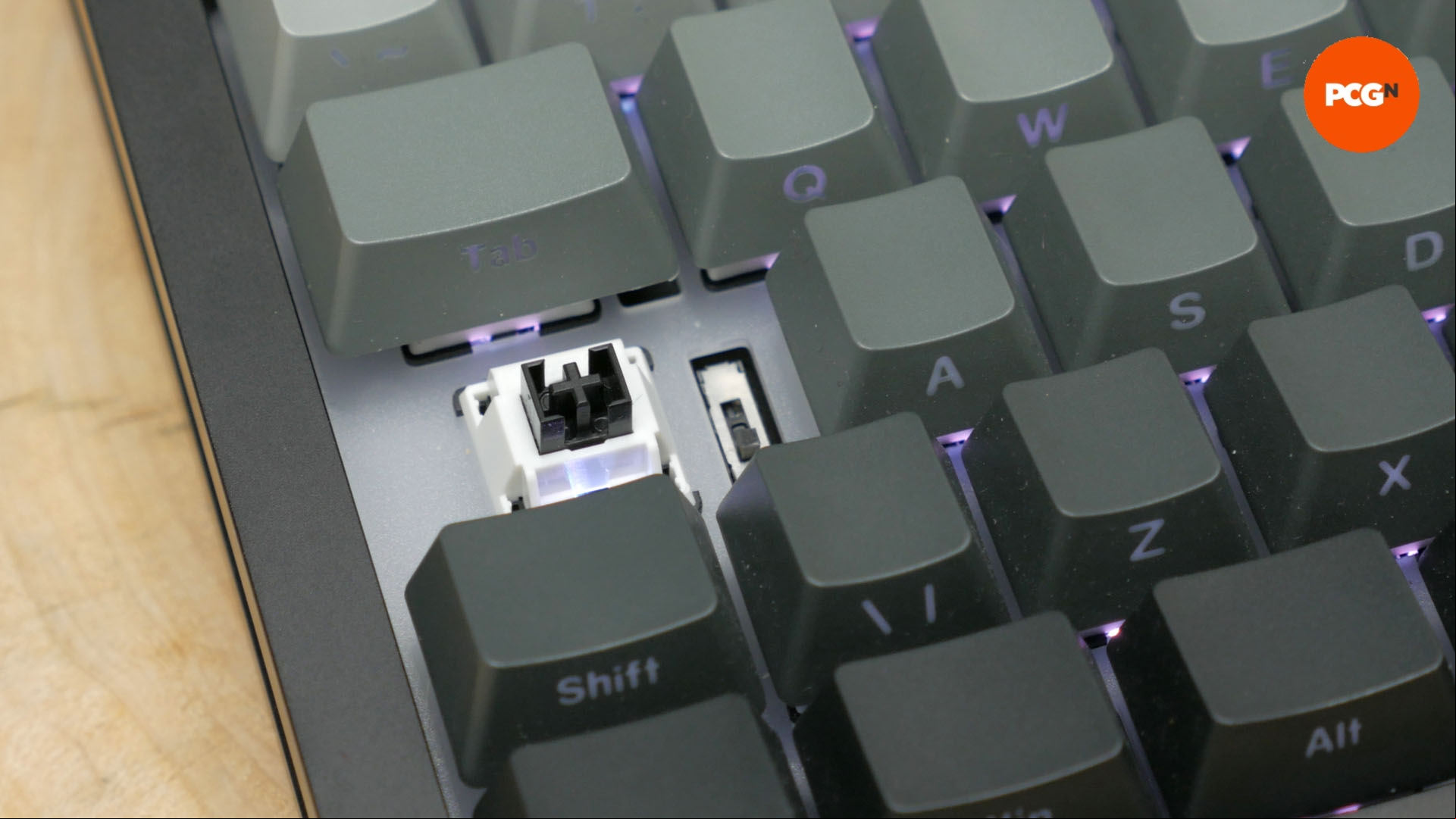 Monsgeek M1W SP review image showing a close up of the wireless switch.