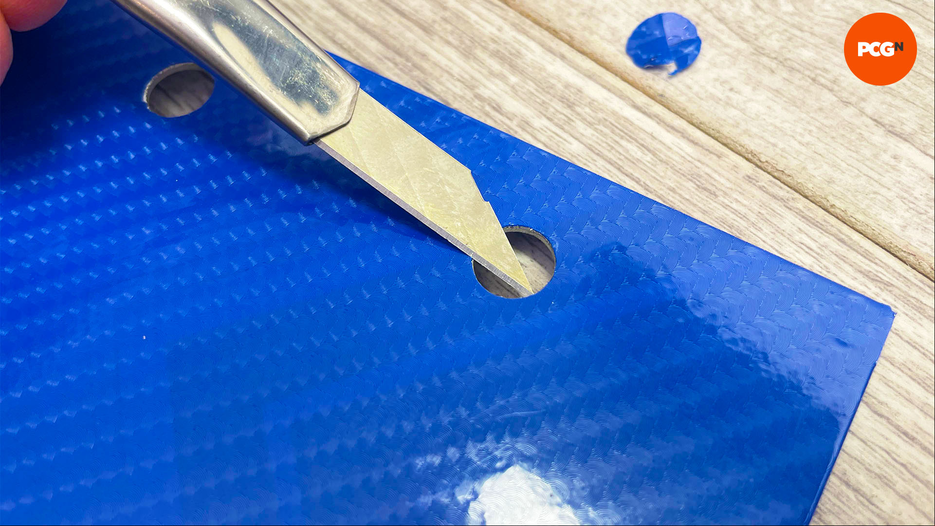 How to change your graphics card color: Cut out screw holes