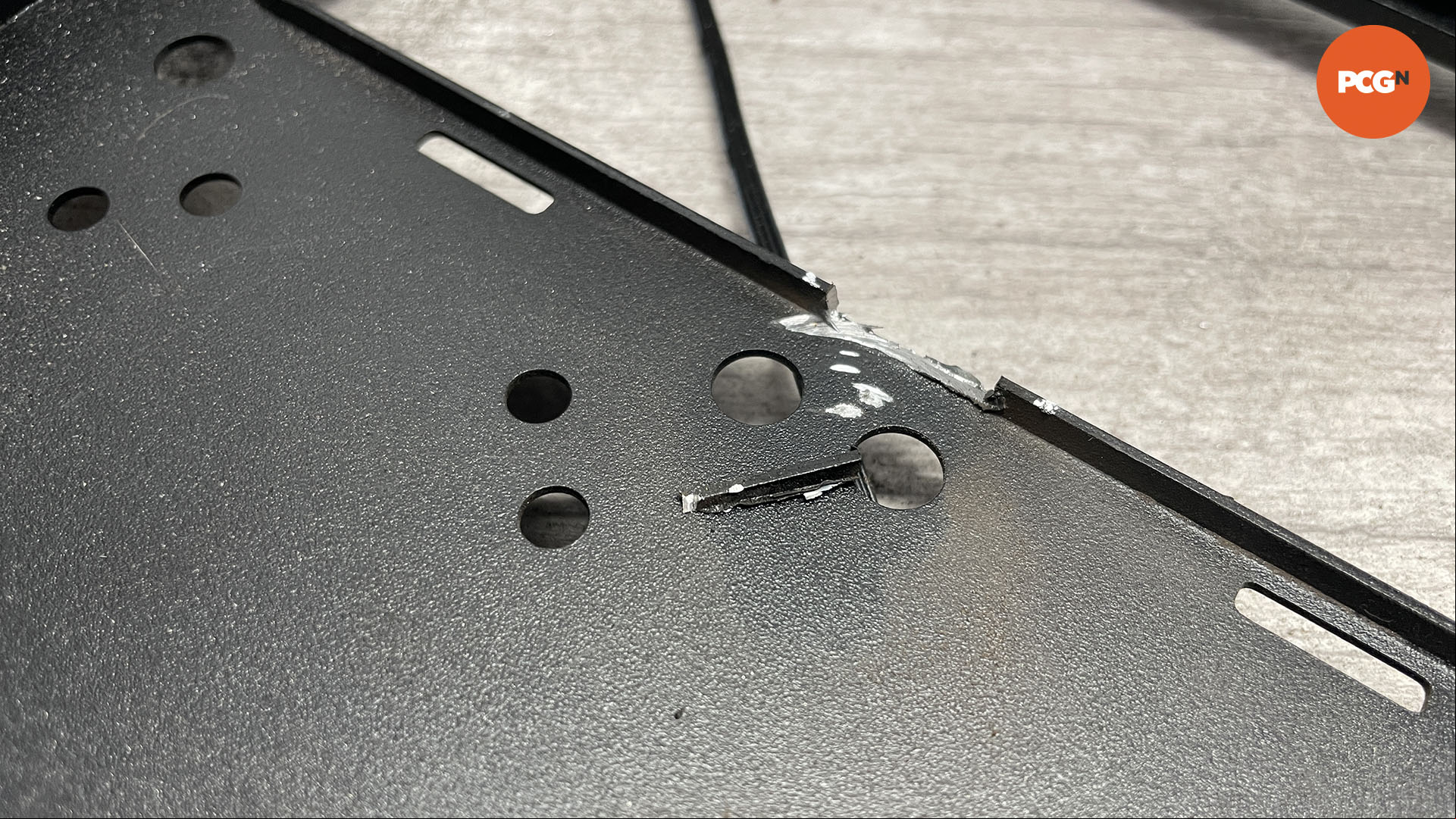How to move the motherboard tray in your PC case: Cut away flanges