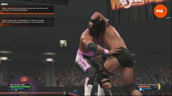WWE 2K24 review: Bret Hart has Stone Cold Steve Austin set up for a Superplex.