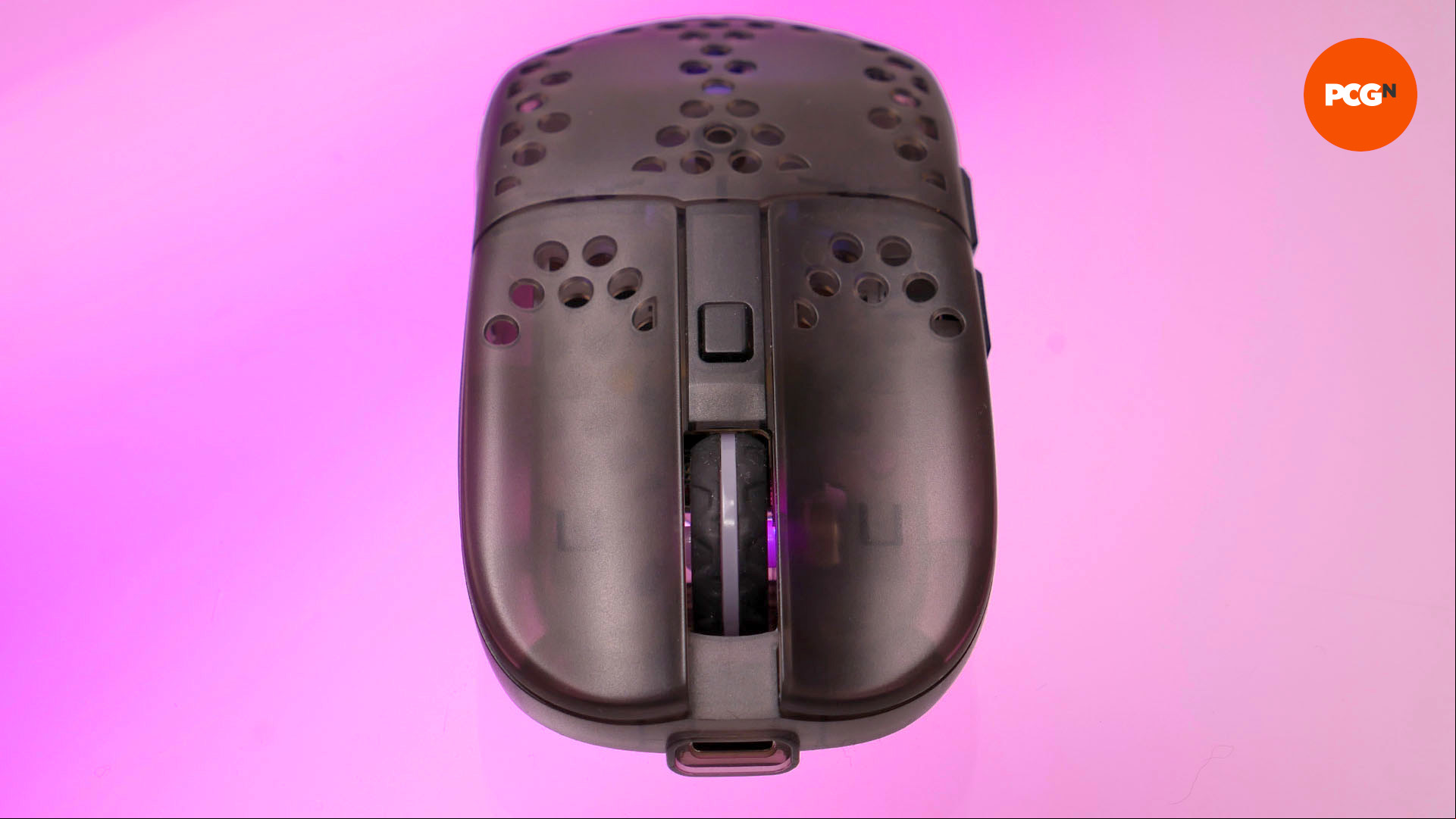 The front of the cherry xtrfy mz1 wireless mouse on a purple background