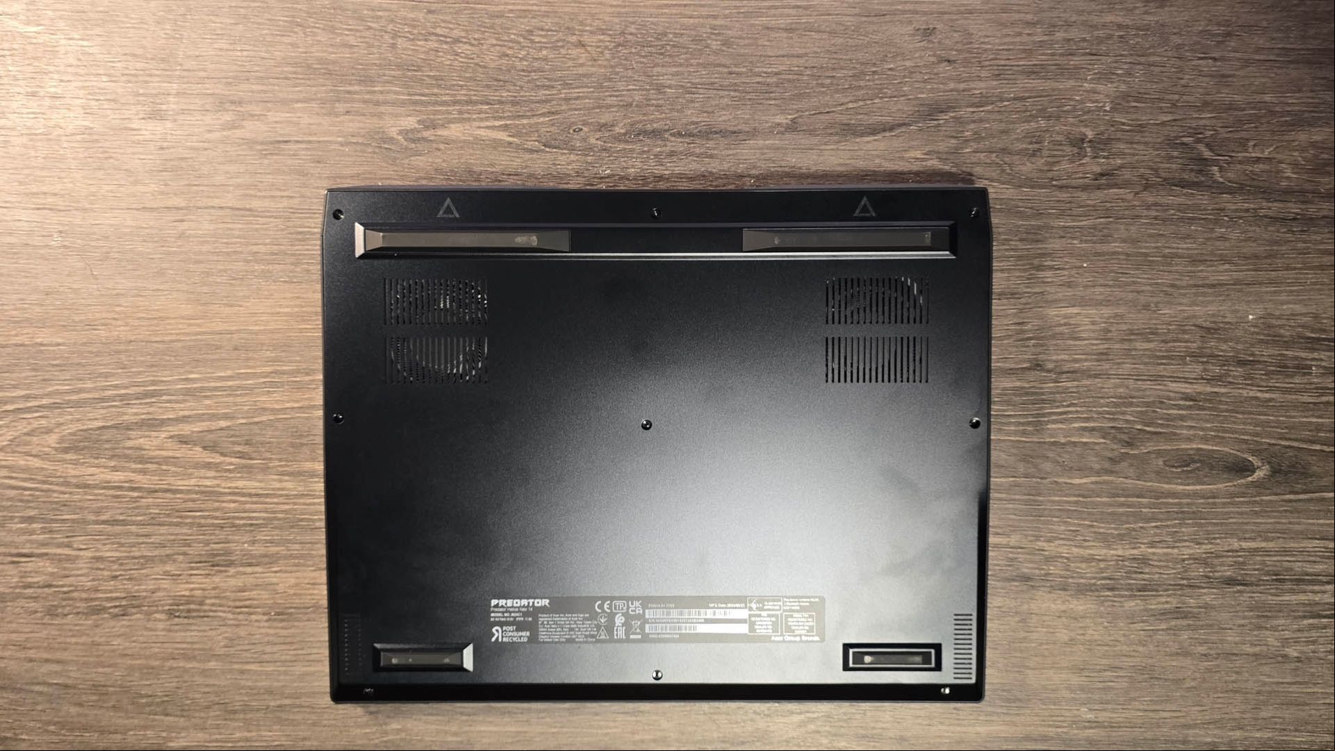 Acer Predator Helios Neo 14 review image showing the bottom of the laptop.