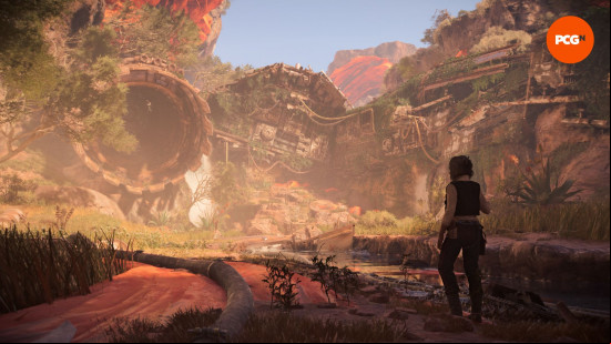 Star Wars Outlaws review: a female human and her pet alien look at a wrecked spaceship.