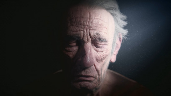 Frostpunk 2 tips: An elderly man looks down, his eyes closed.