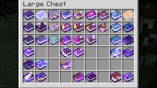 A large chest full of enchanted books, each with their own unique texture thanks to the Even Better Enchants Minecraft texture pack.